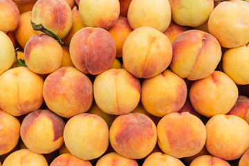 Fresh ripe peaches background