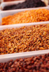 Heaps of assorted raisins