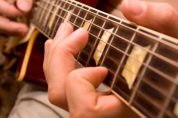 Play the guitar