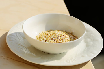 Cereal oat flakes in bowl