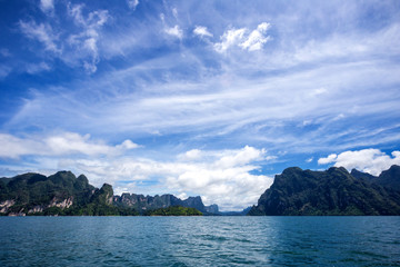 Fototapeta na wymiar environment of mountains and river natural attractions in Ratchaprapha Dam at Khao Sok National Park, Surat Thani Province, Thailand.