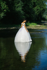 pretty bride in water
