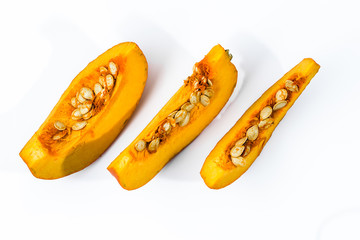Isolated pumpkin slices on white, flat lay from above
