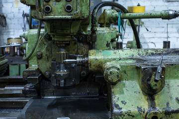 Fototapeta na wymiar Vintage green lathe factory