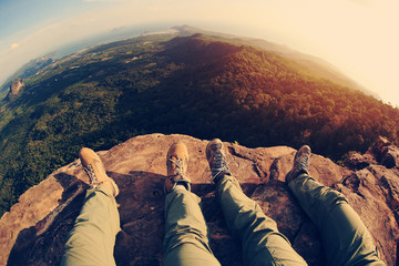 hiking legs enjoy the view on mountain peak