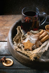 Hot red mulled wine with cookies 