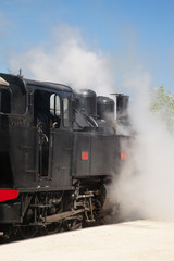 Fototapeta na wymiar Départ de la locomotive à vapeur
