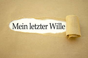 Abgerissenes Papier mit Testament und Mein letzter Wille