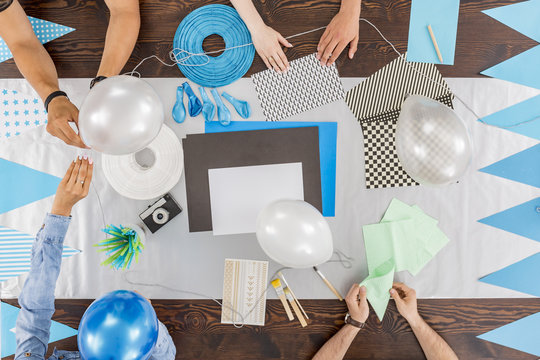 Preparing decorations for the baby shower