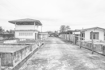 Obraz premium Abandoned and old building exterior. destroyed factory/industrial architecture. Dramatic Scene.