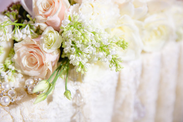 A closeup of a rose surrounded by greenery