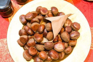 Backed chestnuts served for a dinner table