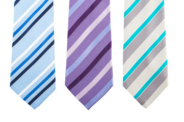 Three variants of a striped tie in colorful stripes. On white, isolated  background. Top view. Flat lay.