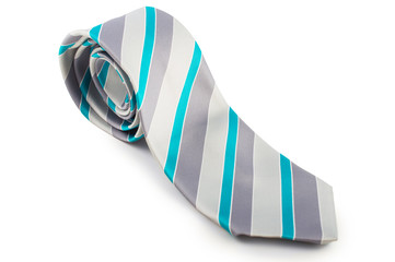 Grey tie with blue stripes. Twisted half. On white, isolated  background.