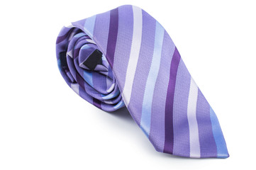 Lilac tie with blue and purple stripes. Twisted half. On white, isolated  background.
