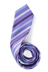 Lilac tie with blue and purple stripes. Twisted half. On white, isolated  background. Top view. Flat lay.