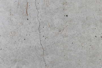 Gray cement wall texture background, crack on cement wall