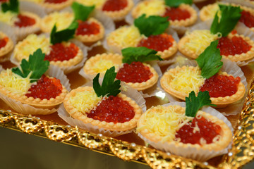 Tartlets with caviar and butter