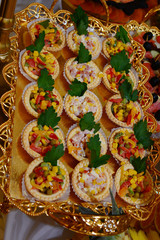 Olivier salad tartlets from appetizer table