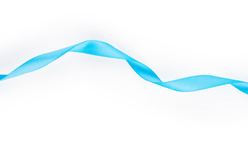 Blue satin ribbon isolated on white background. Top view. Flat lay.