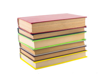 stack of multicolored books. on white, isolated background.