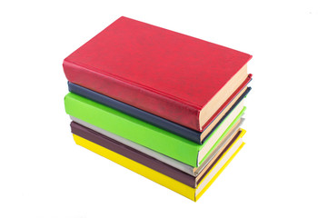 stack of multicolored books. on white, isolated background.