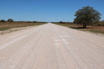 Dusty long road in Namibia, Africa 