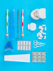 Oral Care and teeth. Dental Set against a blue background