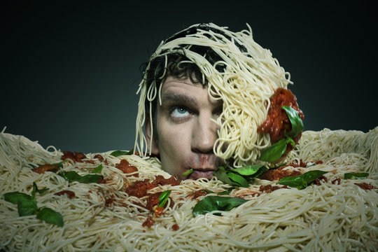 Man drowning in spaghetti. 