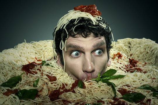 Man drowning in spaghetti. 