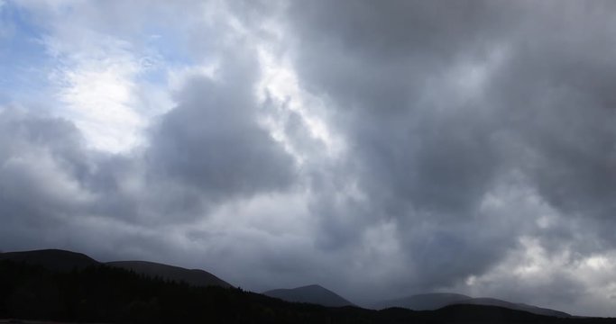 Time-lapse of dark rain clouds over Scottish Highland hills