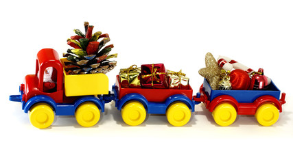 Toys, car-truck and Santa Claus with gift