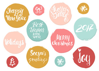 Obraz premium Hand drawn holiday lettering in grunge style circles . Christmas collection of unique lettering for greeting cards, stationary, gift tags, scrapbooking, flyers. Vector Trendy xmas design elements.
