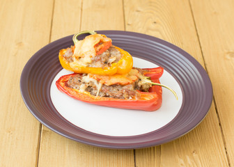 Baked pepper with meat, cheese and tomatoes.