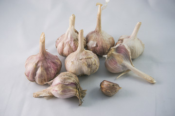 garlic lies on a white background vegetables on white background