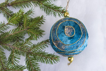 Christmas and New Year composition with green fir tree branch with beautiful decorations