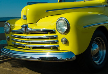 Obraz na płótnie Canvas Old Yellow Truck with Chrome Grill