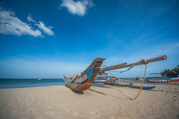 Colorful boat at Trincomalee beach in Sri Lanka