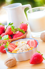 Breakfast with cereals, fresh fruit and milk