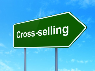 Finance concept: Cross-Selling on road sign background