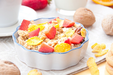 Breakfast with cereals, fresh fruit and milk