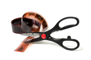 Scissors cut film isolated on white background