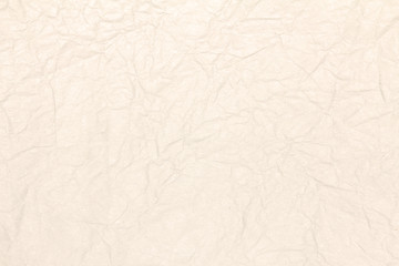 Recycled crumpled light brown paper texture or paper background for design with copy space for text or image.