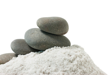 Fototapeta na wymiar pile of pebbles in a handful of sea salt