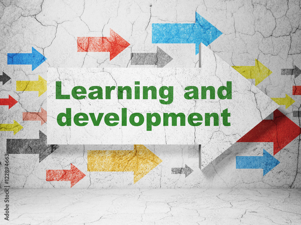 Poster learning concept: arrow with learning and development on grunge wall background