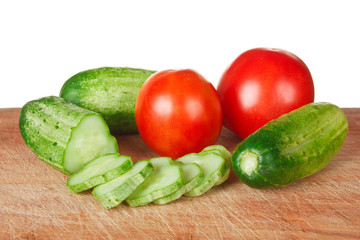chop tomatoes and cucumbers