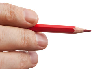 red pencil in hand