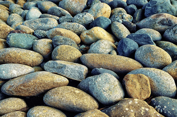 Mountain pebbles lying on the river