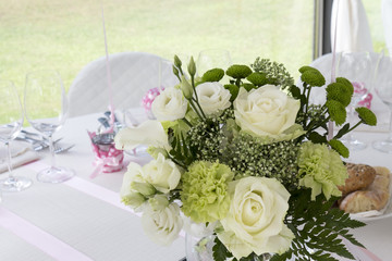 Restaurant with tables set for a wedding reception