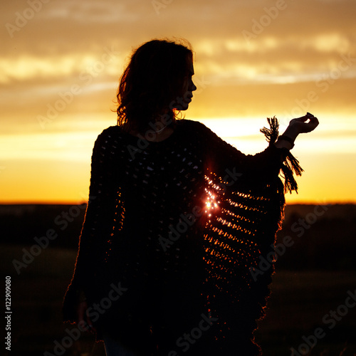 Silhouette Of Happy Young Woman On Sunset Outdoor Girl In